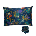 Tiger print silk pillowcase and scrunchie on a white background