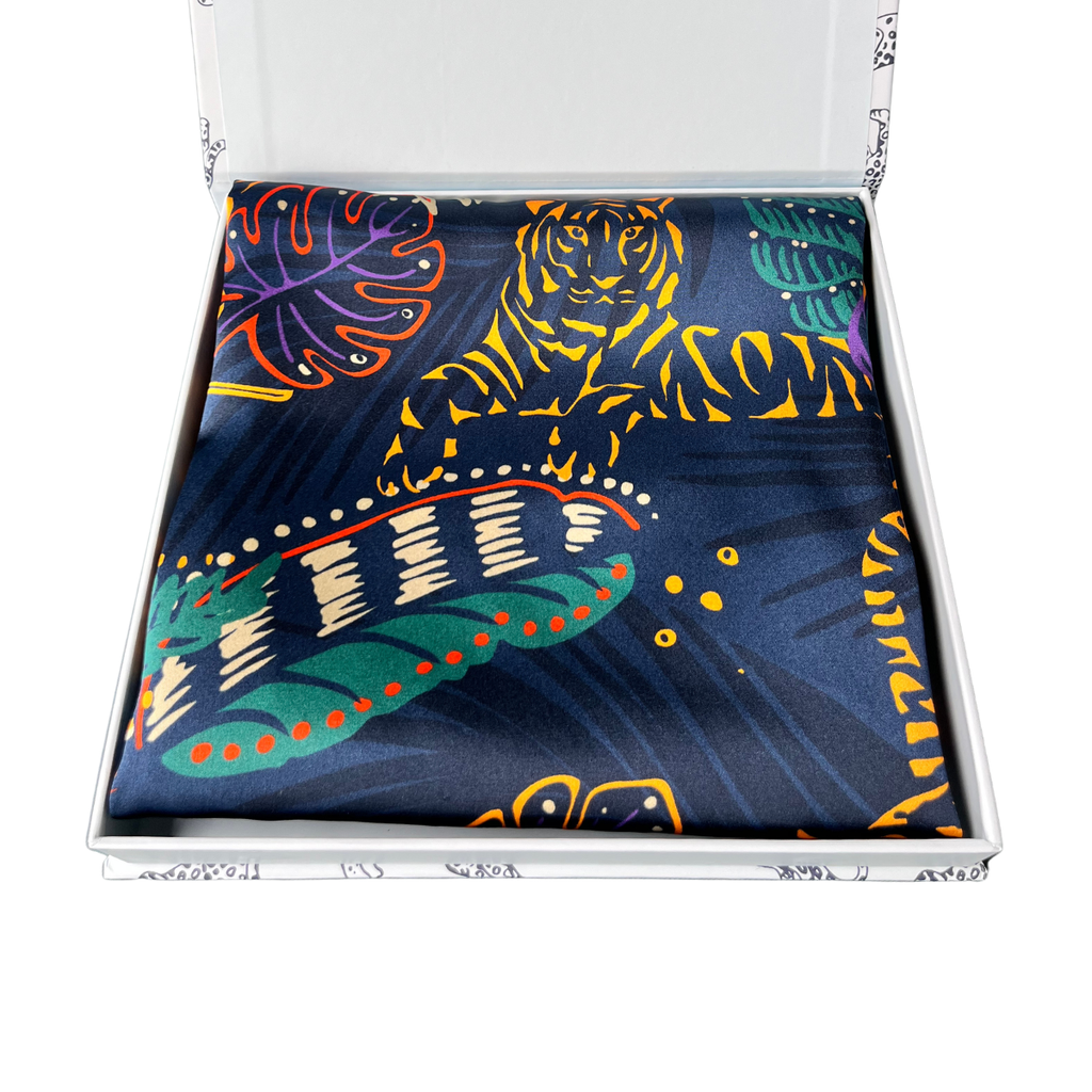 MYRN Silk tiger print silk pillowcase folded within a presentation box on a white background.