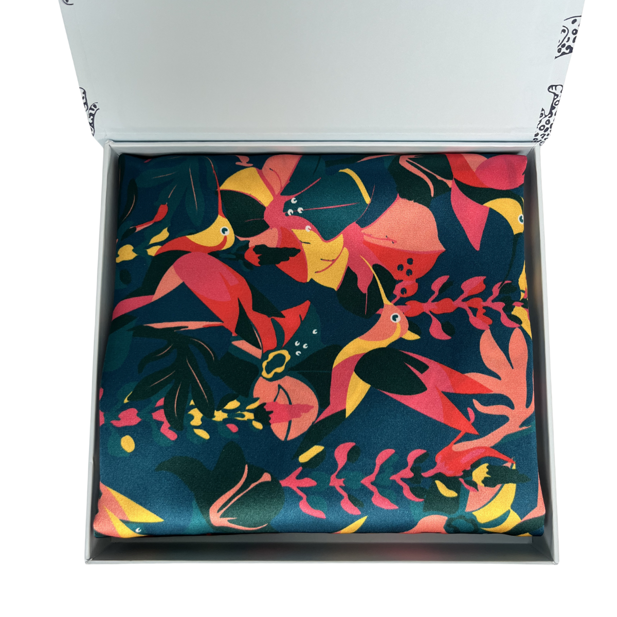 MYRN Silk floral hummingbird print silk pillowcase folded within a presentation box on a white background.