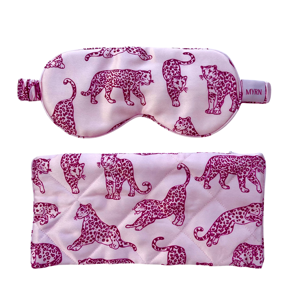 MYRN Silk pink leopard print silk eye mask with a matching zipped travel case on a white background